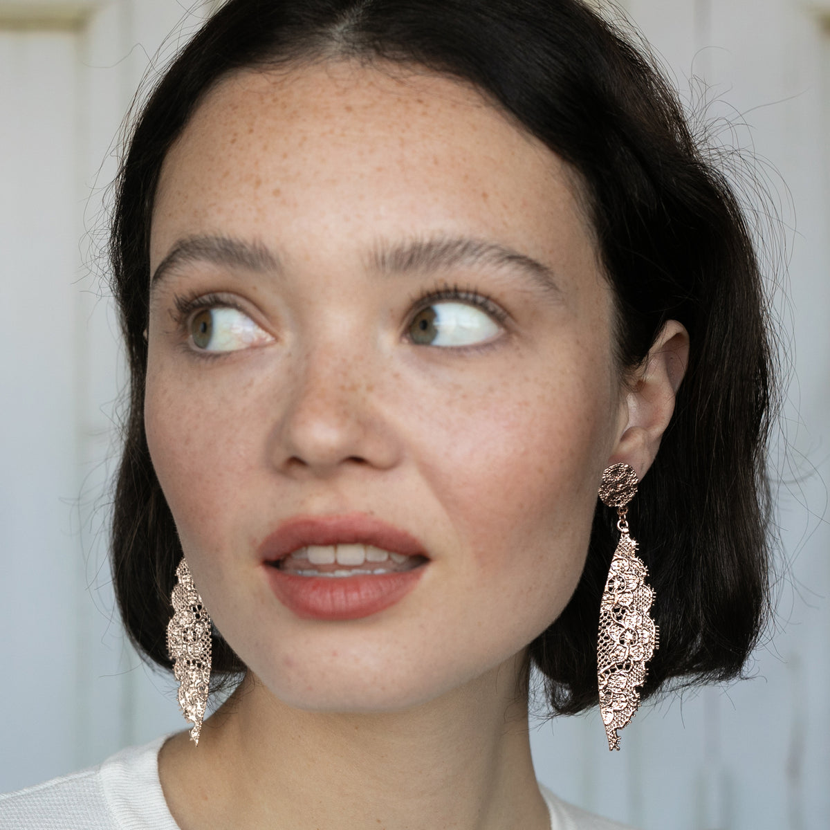 Model with Stunning Eyelash Lace Earrings in Rose Gold. Unique 13th Anniversary Gift. Made with European Chantilly lace.