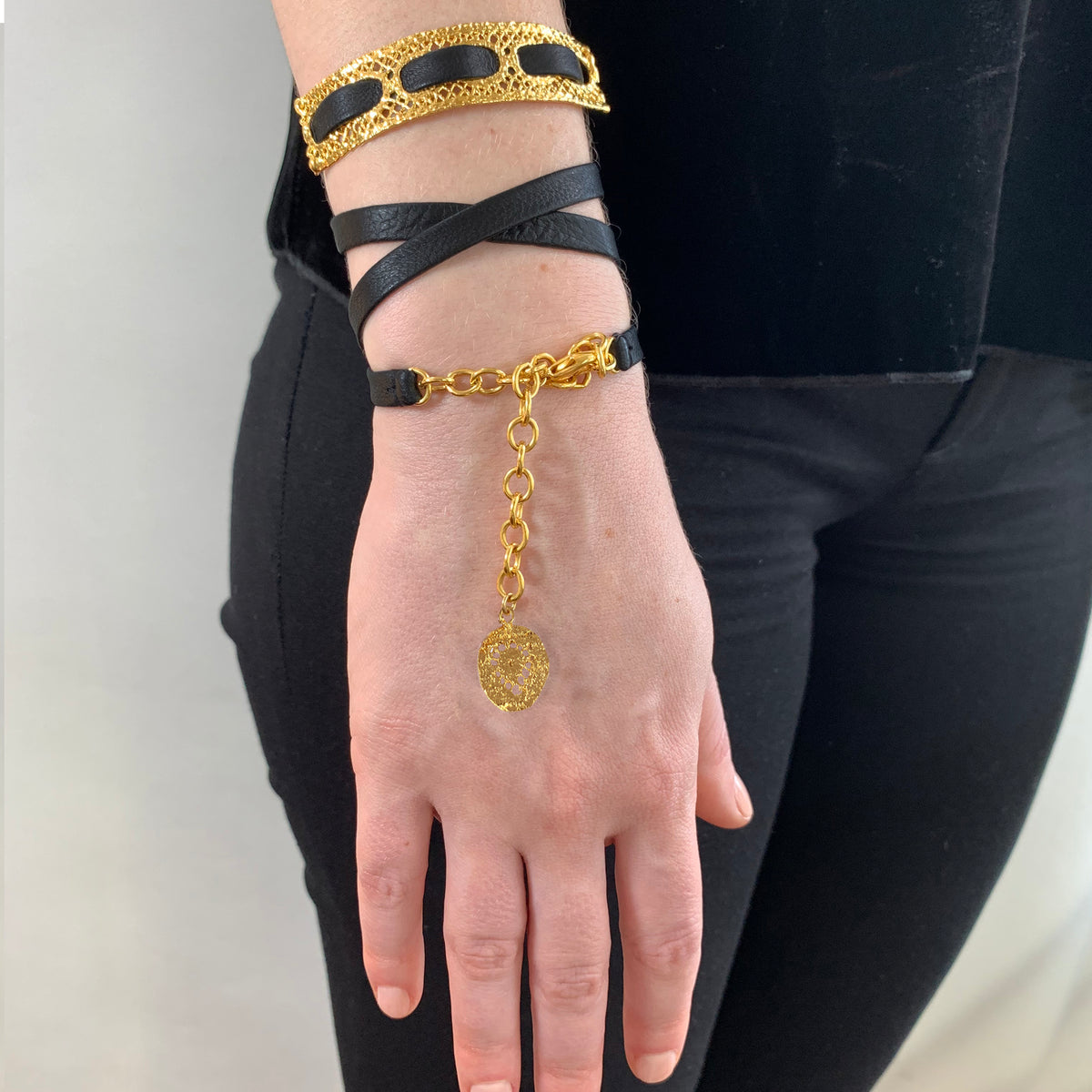 Leather bracelet with vintage lace dipped in 24k gold.