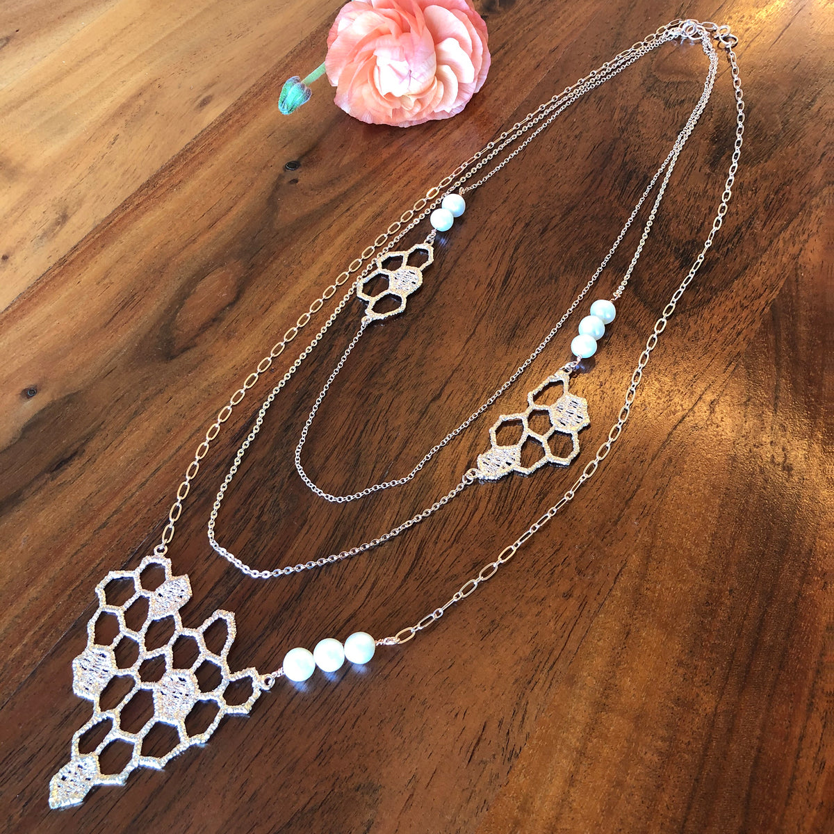 Honeycomb lace pendant necklace in rose cold with white fresh water pearls.