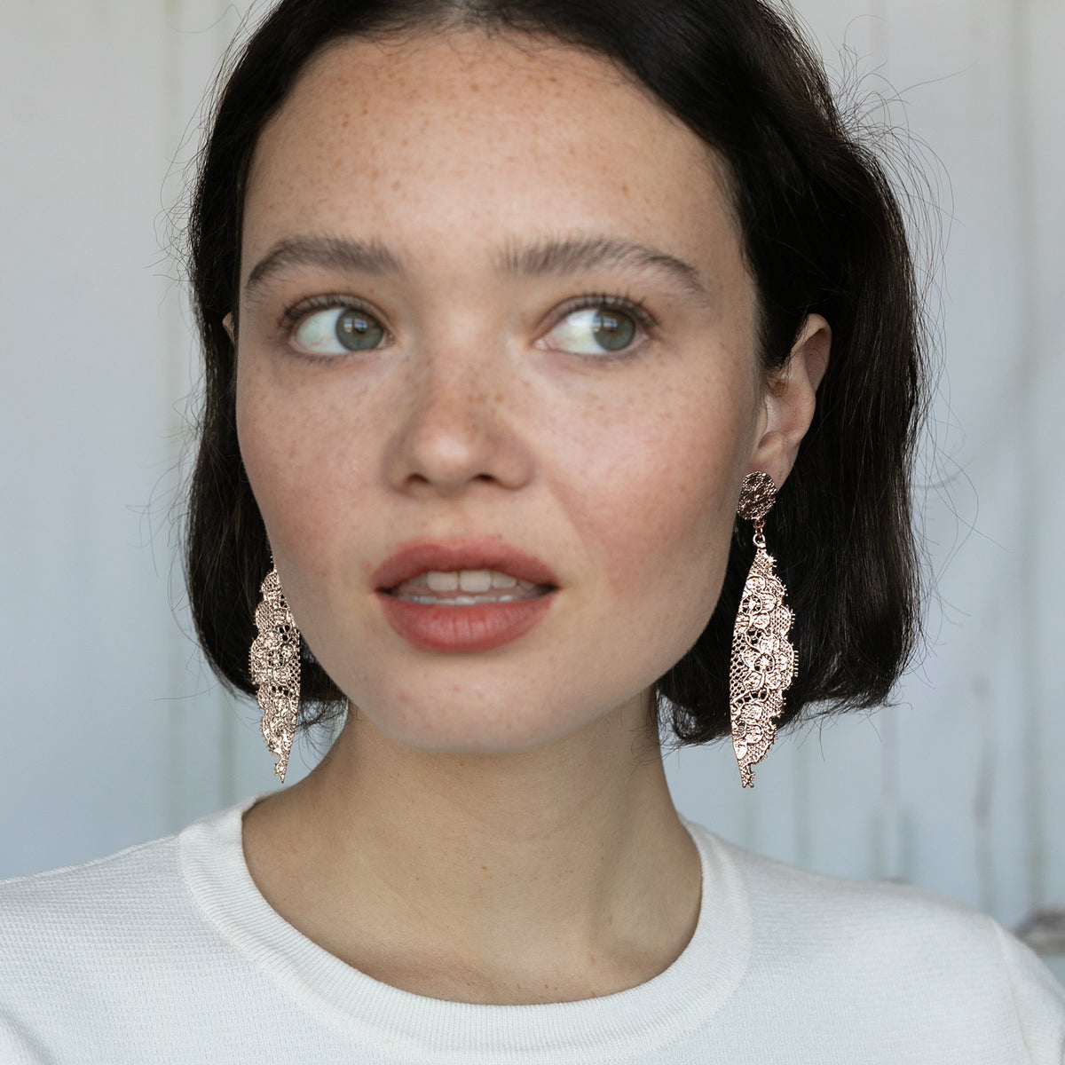 Model with Stunning Eyelash Lace Earrings in Rose Gold. Unique 13th Anniversary Gift. Made with European Chantilly lace.