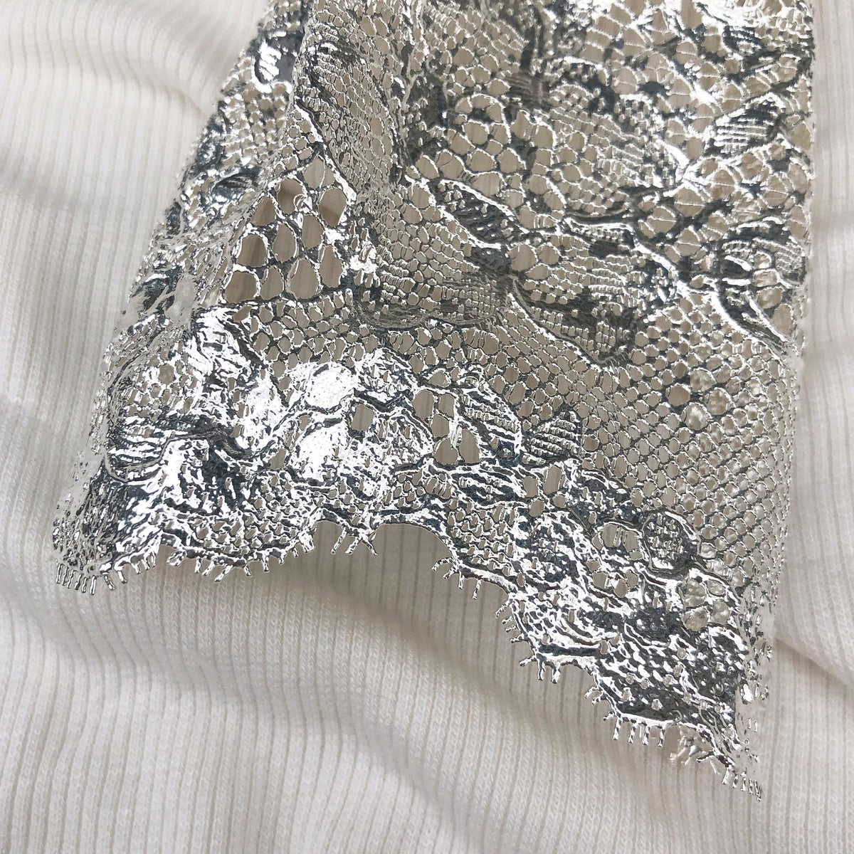 Eyelash Lace Border of Tie Lace Necklace Made from Chantilly Lace dipped in Sterling Silver.