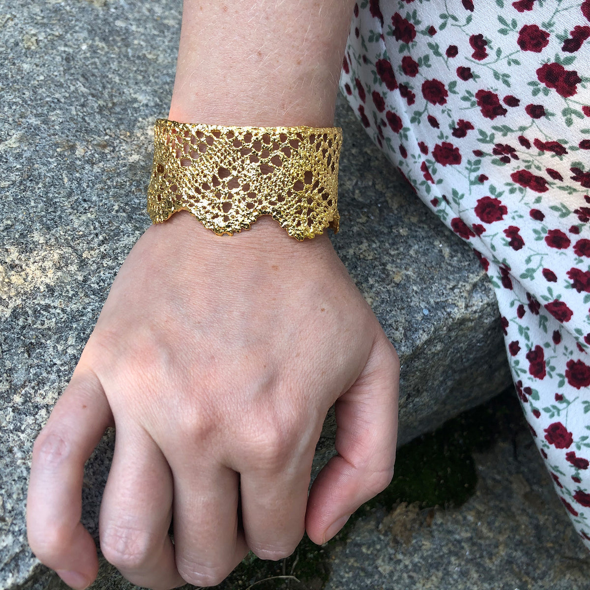 Model showing rare cuff bracelet made from 1890s Swedish lace dipped in 24k gold.