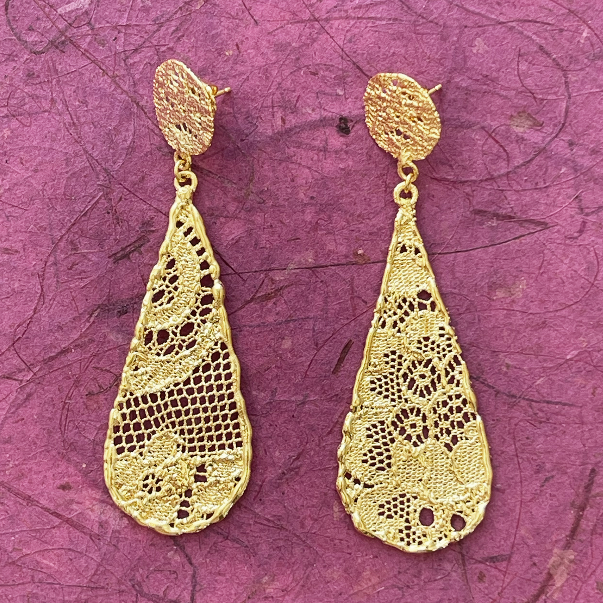 Teardrop lace earrings dipped in 24k gold.