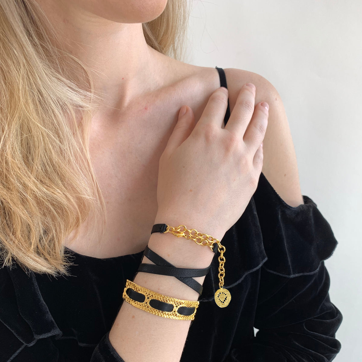 Leather bracelet with vintage lace dipped in 24k gold.