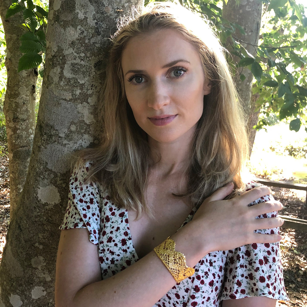 Model showing rare cuff bracelet made from 1890s Swedish lace dipped in 24k gold.