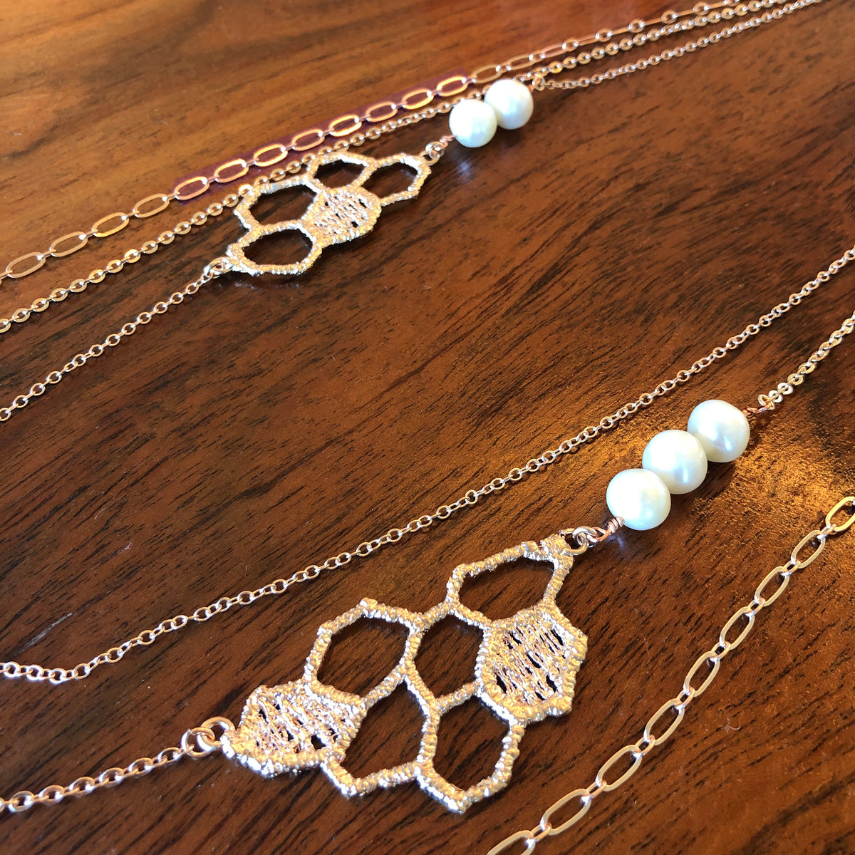 Honeycomb lace pendant necklace in rose cold with white fresh water pearls.