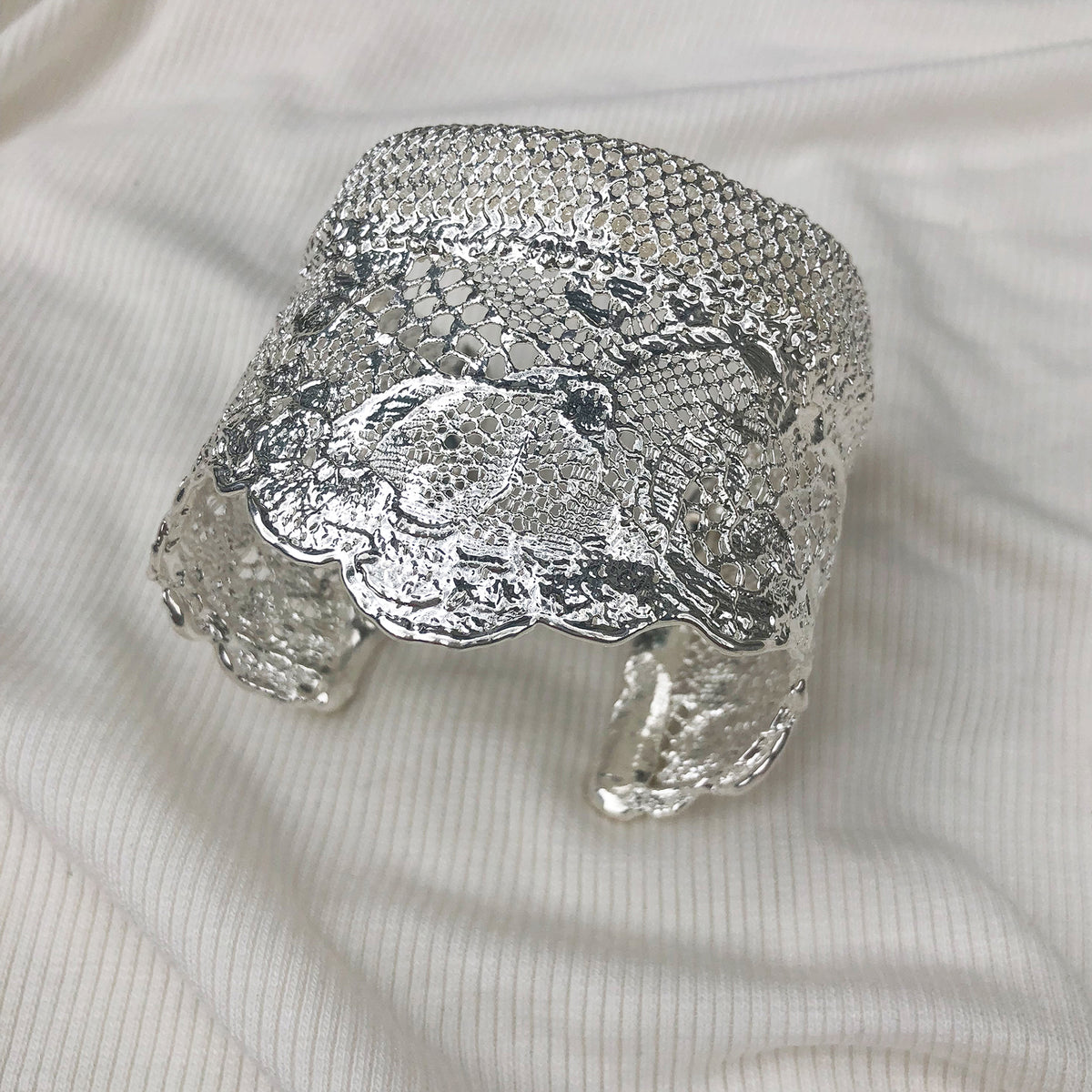 Top of Silver lace cuff bracelet, mix of feminine Chantilly lace and masculine mesh. Dipped in sterling silver. 