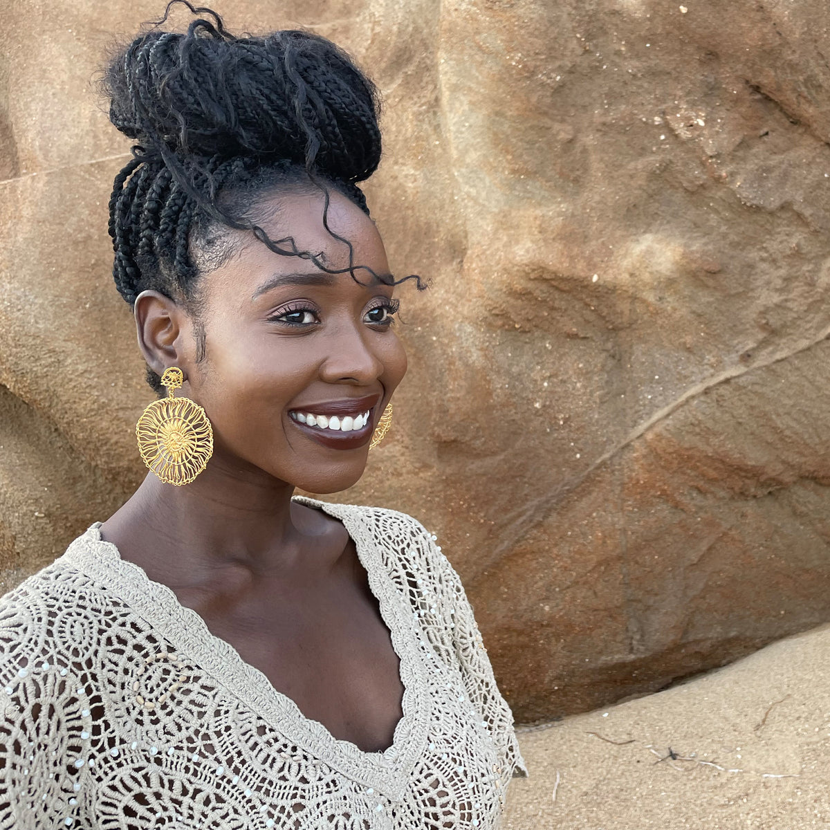 Circular lace pendant earrings made from Tenerife lace. Solidified in 24k gold.