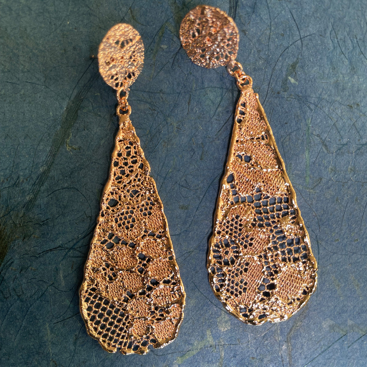 Teardrop lace earrings dipped in rose gold.