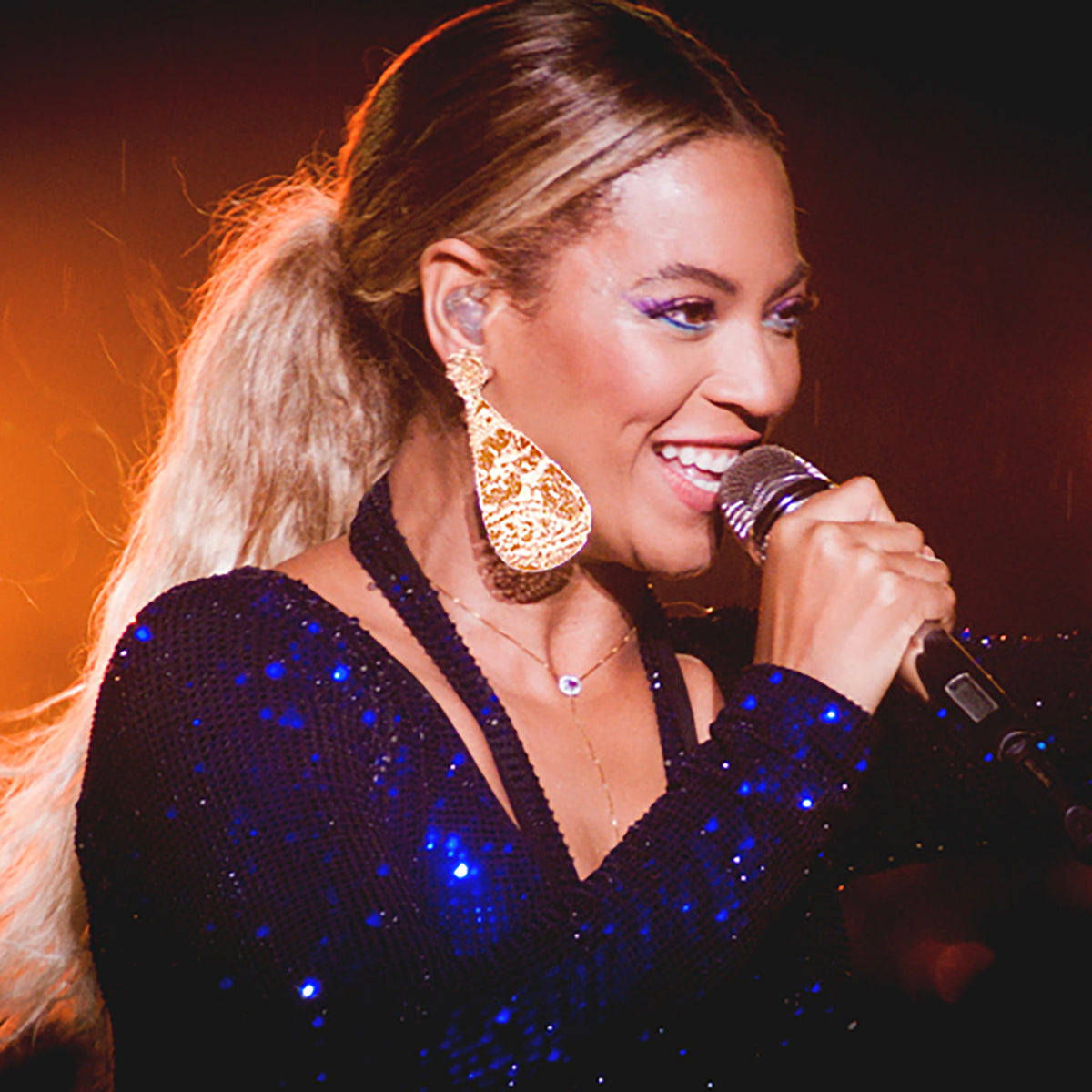 Leopoldine lace teardrop earrings in 24k gold worn by Beyoncé on The Mrs. Carter World Tour. Photo by Nina Quintana.