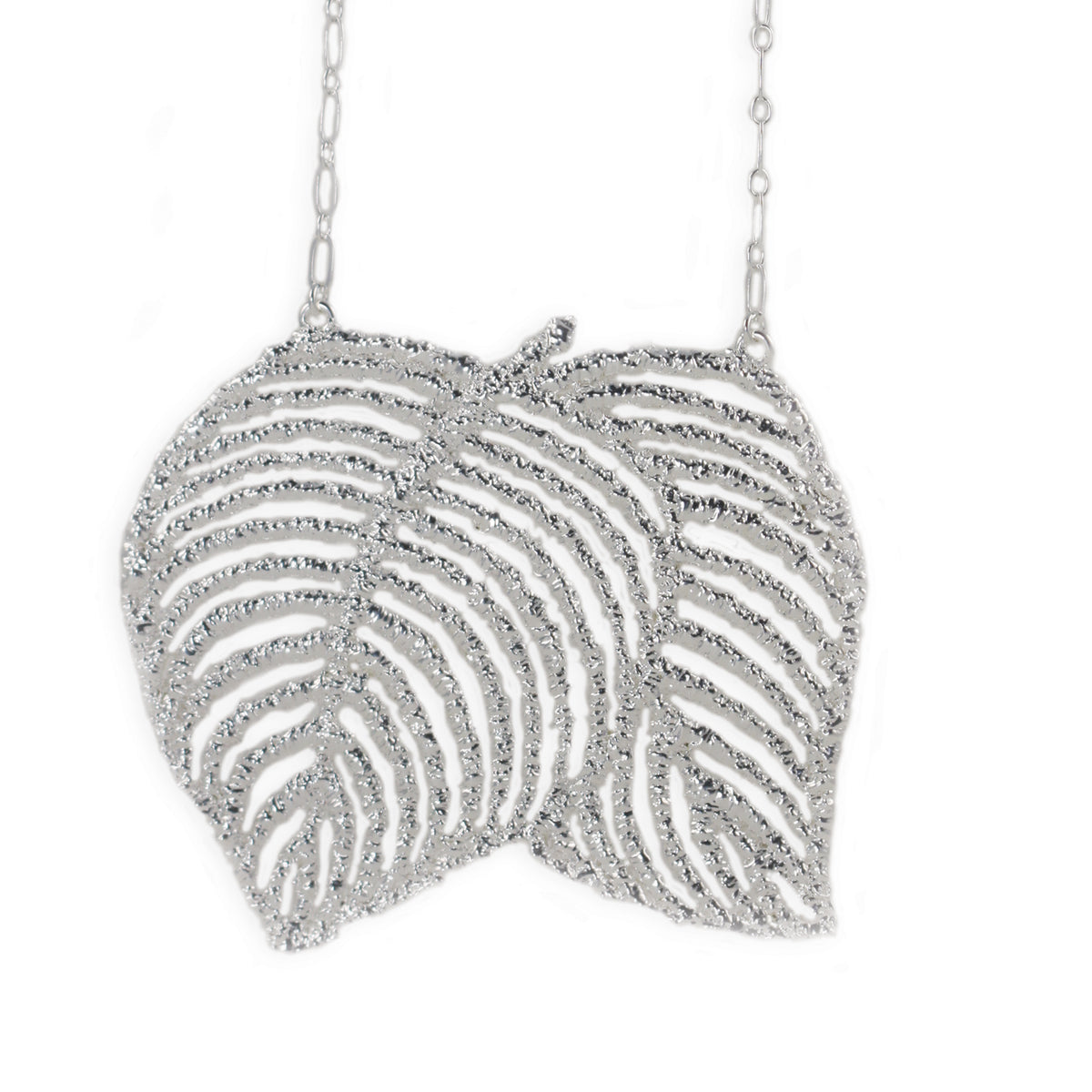 Lace leaf necklace in dipped sterling silver.