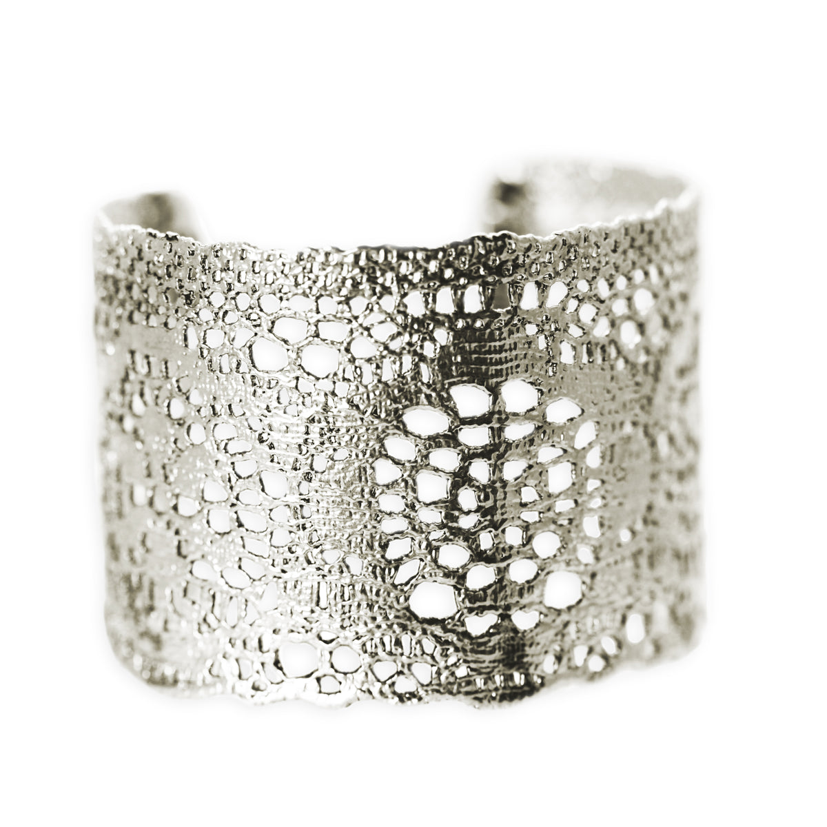 Lace cuff bracelet made from 1950s New York Raschel lace dipped in sterling silver.
