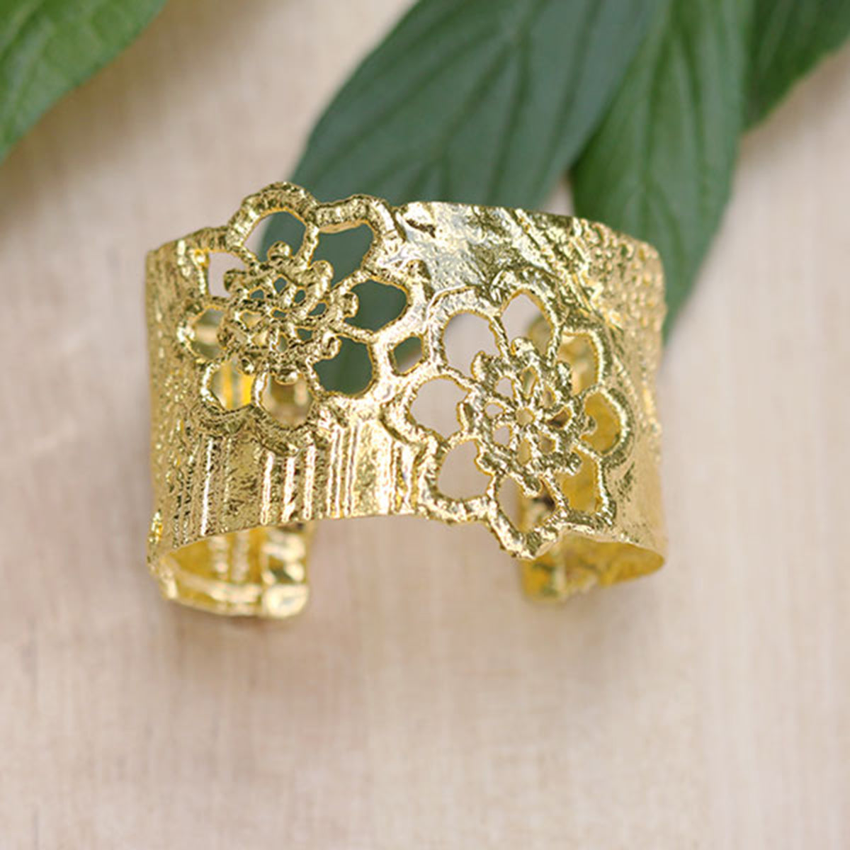 Esperanza lace cuff bracelet dipped in 24k gold.