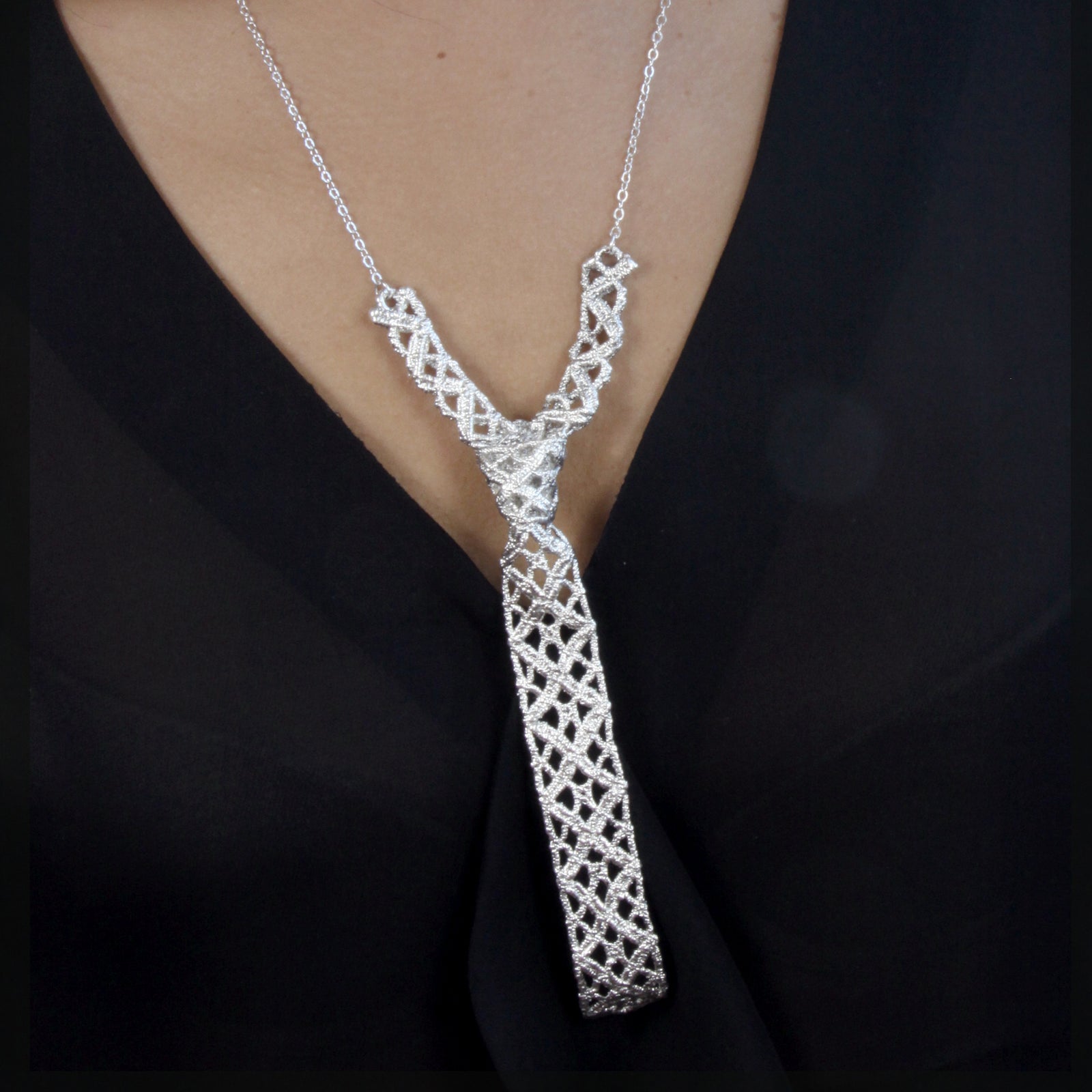 Lace tie necklace in dipped sterling silver.