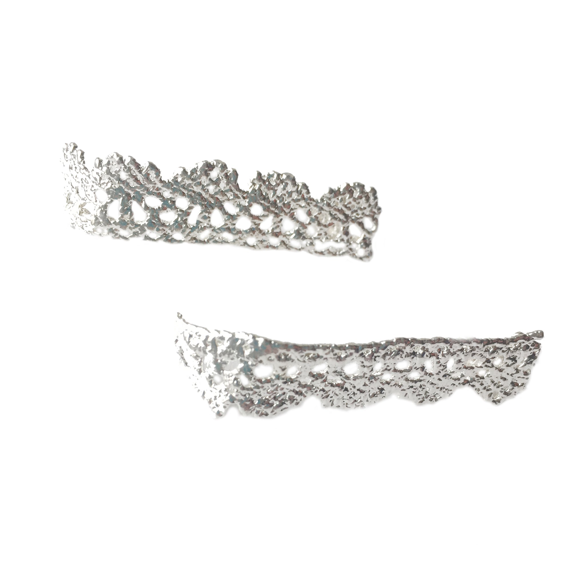 Elegant lace earrings with scalloped edge dipped in sterling silver.