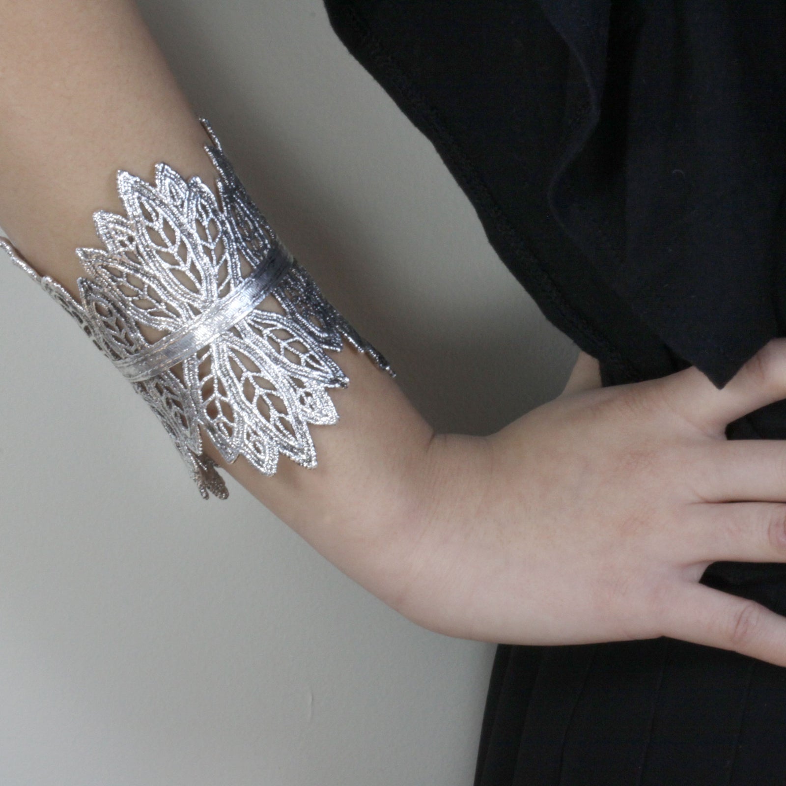 Lace cuff bracelet made from 1950s French leaf lace dipped in sterling silver.