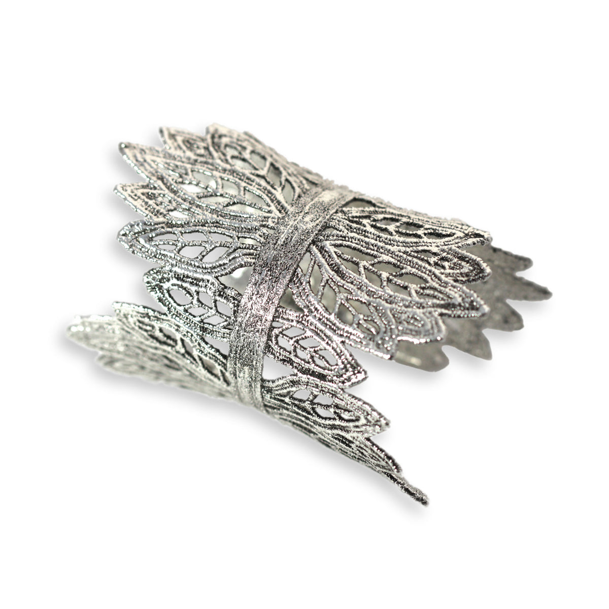 Lace cuff bracelet made from 1950s French leaf lace dipped in sterling silver.