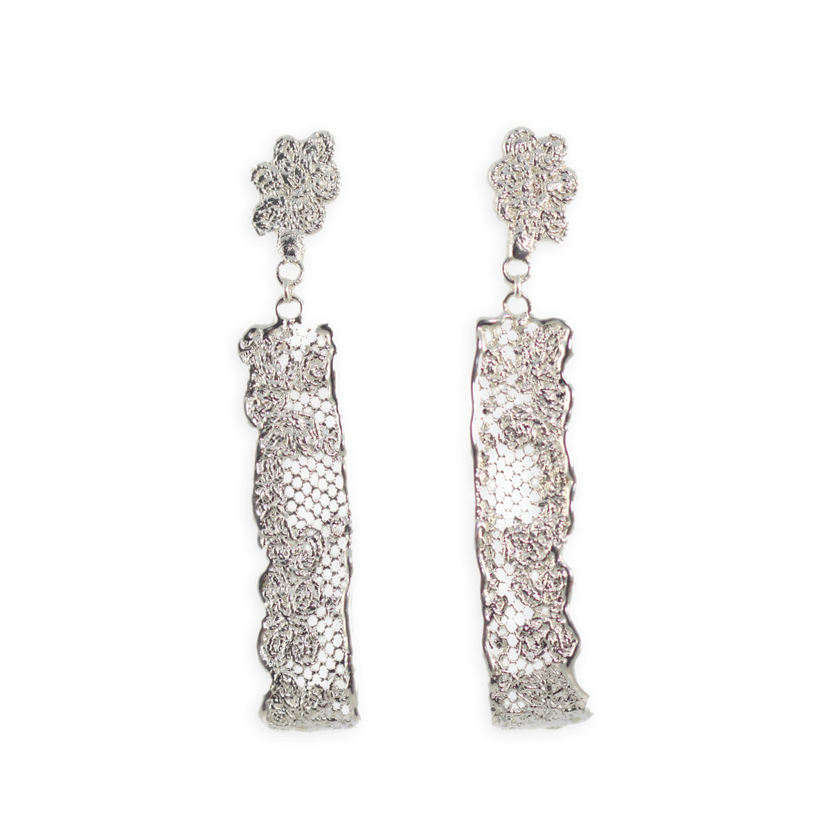 Long lace earrings with fine details in sterling silver.
