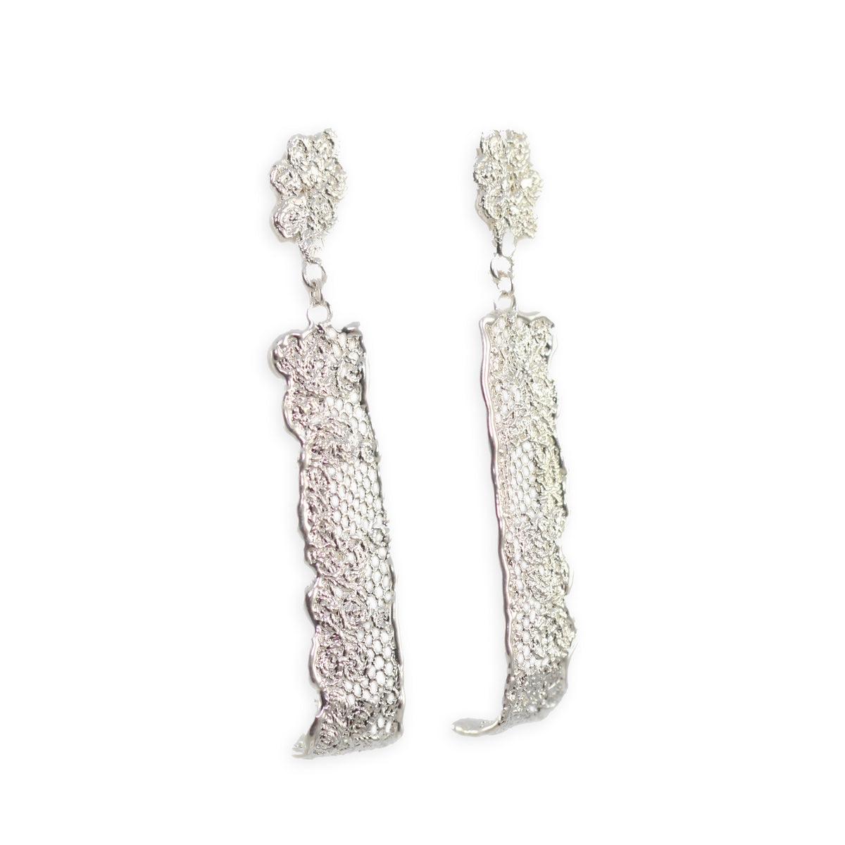 Long lace earrings with fine details in sterling silver.