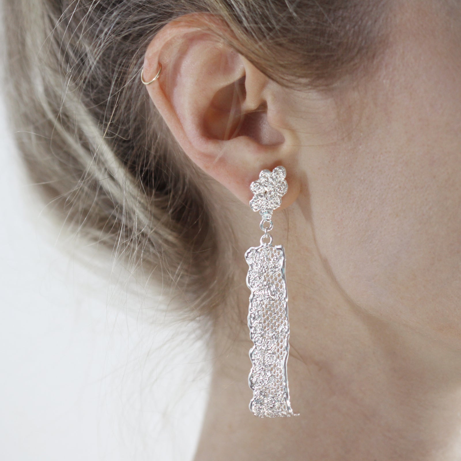 Long lace earrings with fine details in 24k gold.