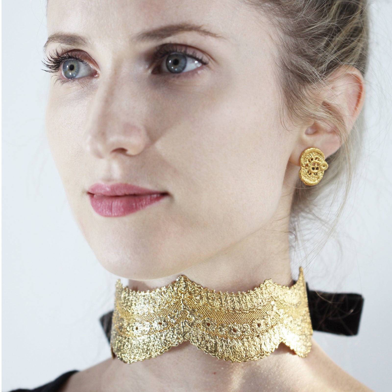 Rare lace choker in 24k gold with velvet tie.