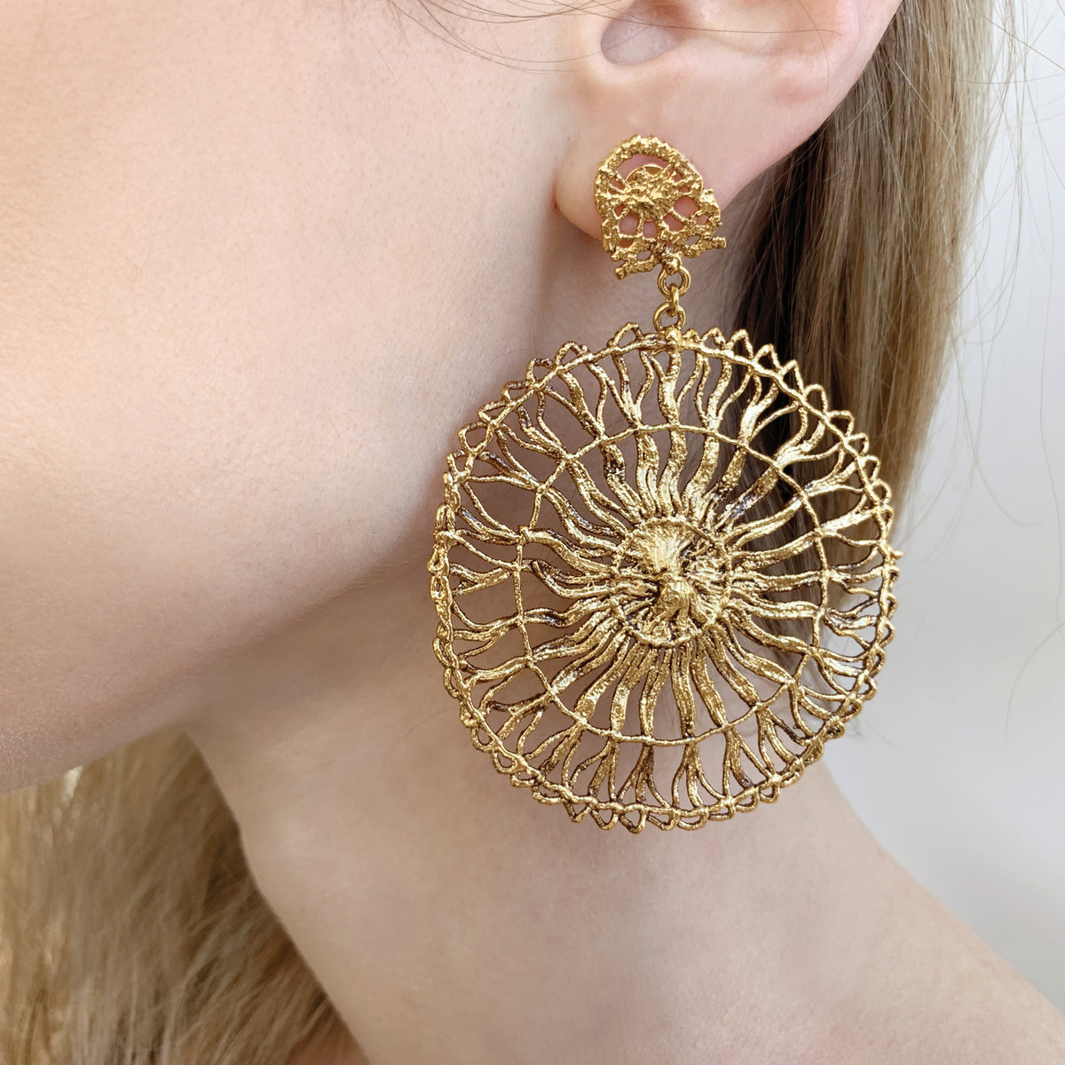 Circular lace pendant earrings made from Tenerife lace. Solidified in 24k gold.