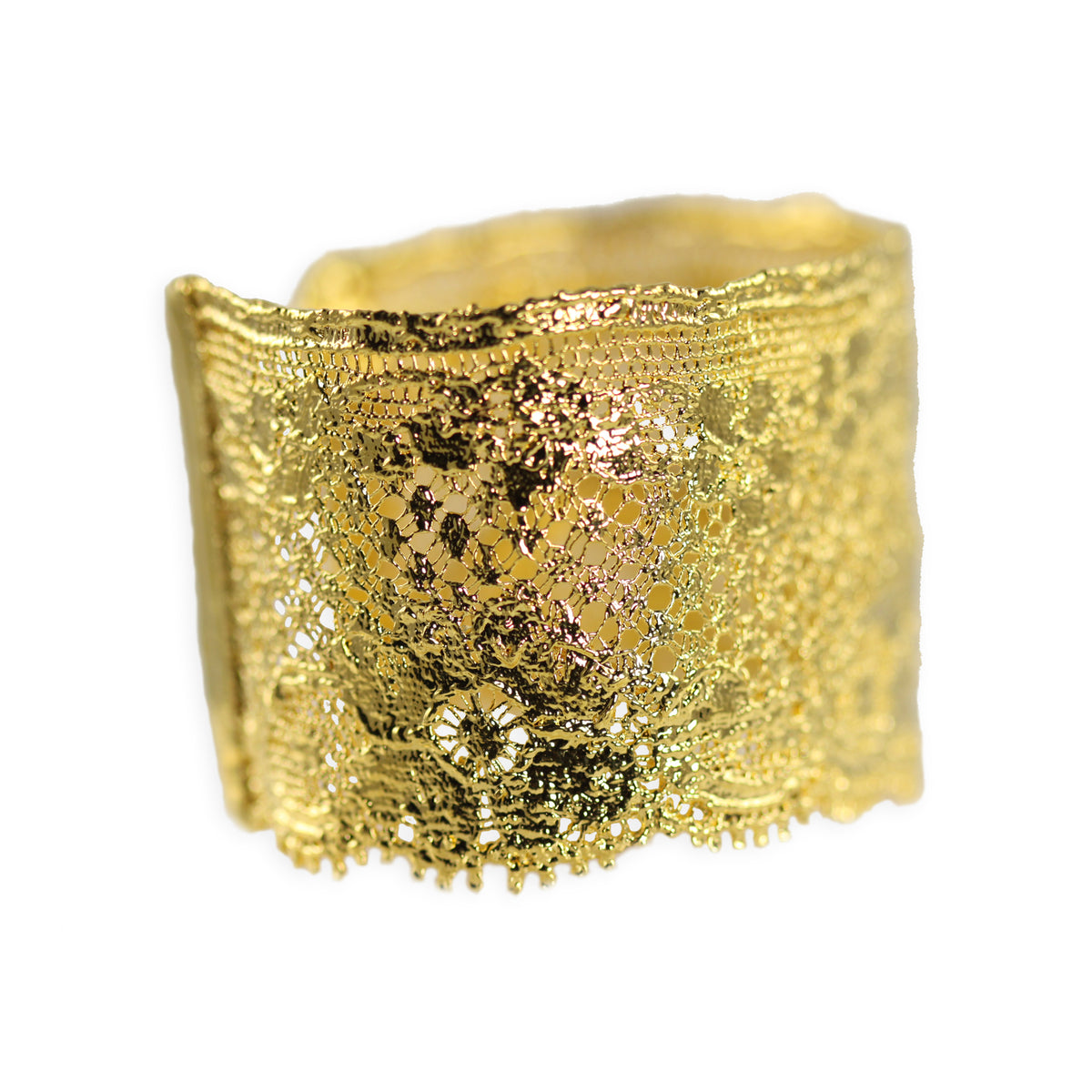 Gorgeous cuff bracelet made from French lace dipped in 24k gold, signed and numbered inside.