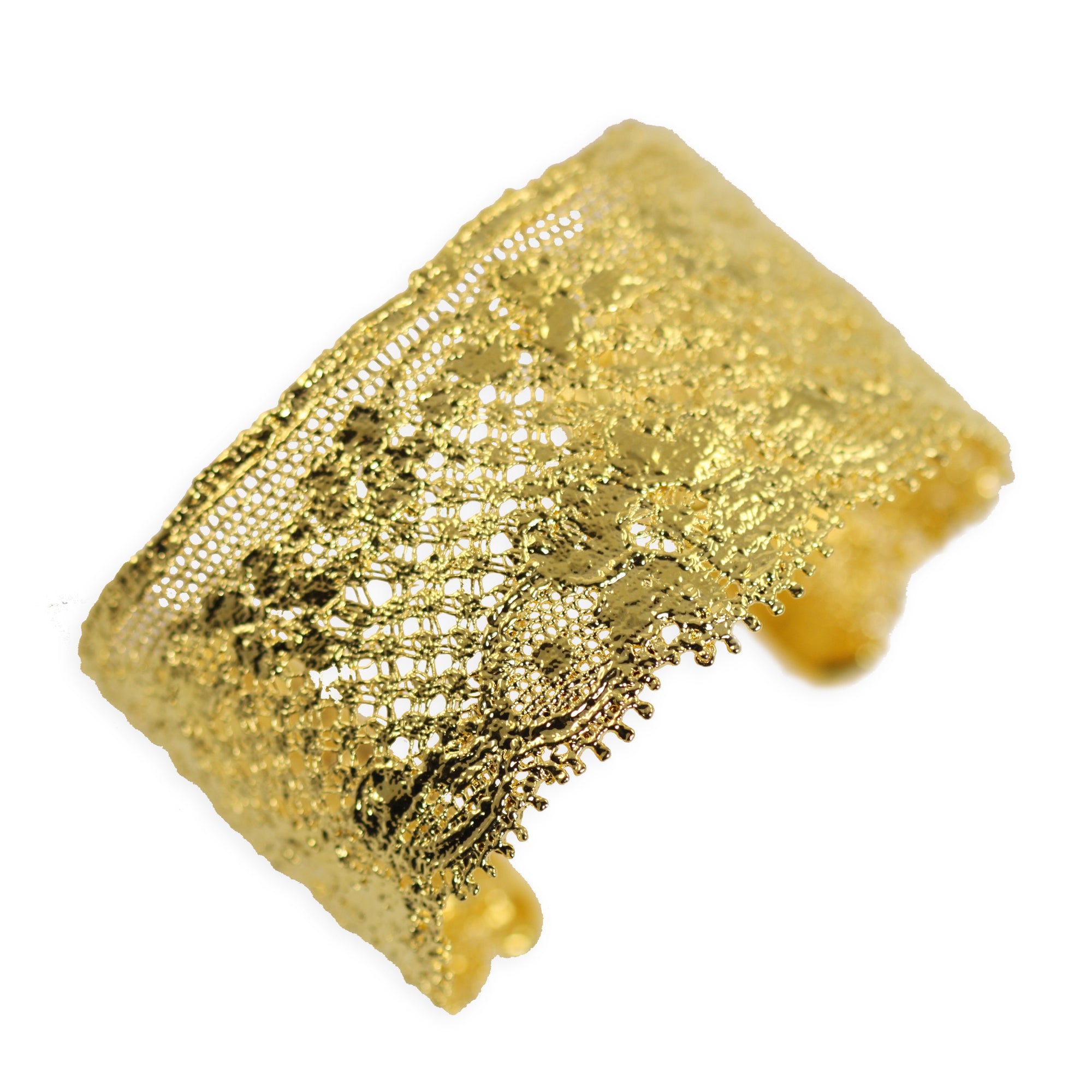 Gorgeous cuff bracelet made from French lace dipped in 24k gold, signed and numbered inside.