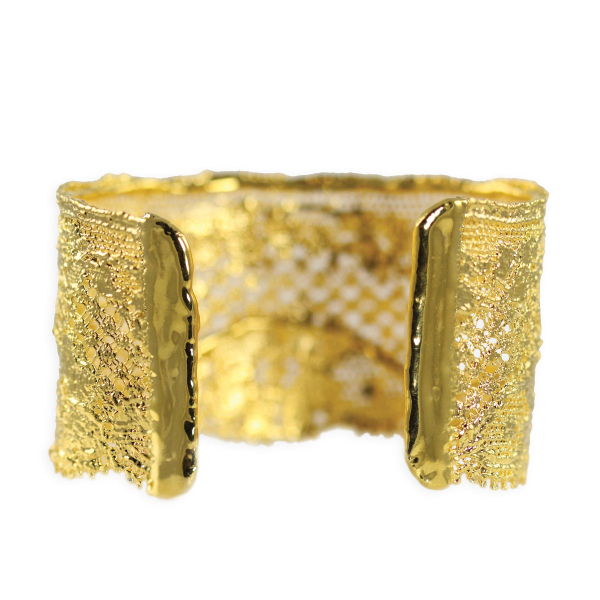 Back view of cuff bracelet made from French lace dipped in 24k gold, signed and numbered inside.